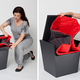Illustration for article titled Fold Out Emergency Chair Hides Inside a Monolithic End Table